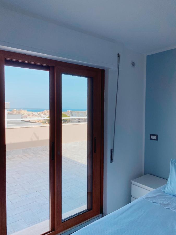شقة Terrazza Delle Rose نيتّونو المظهر الخارجي الصورة