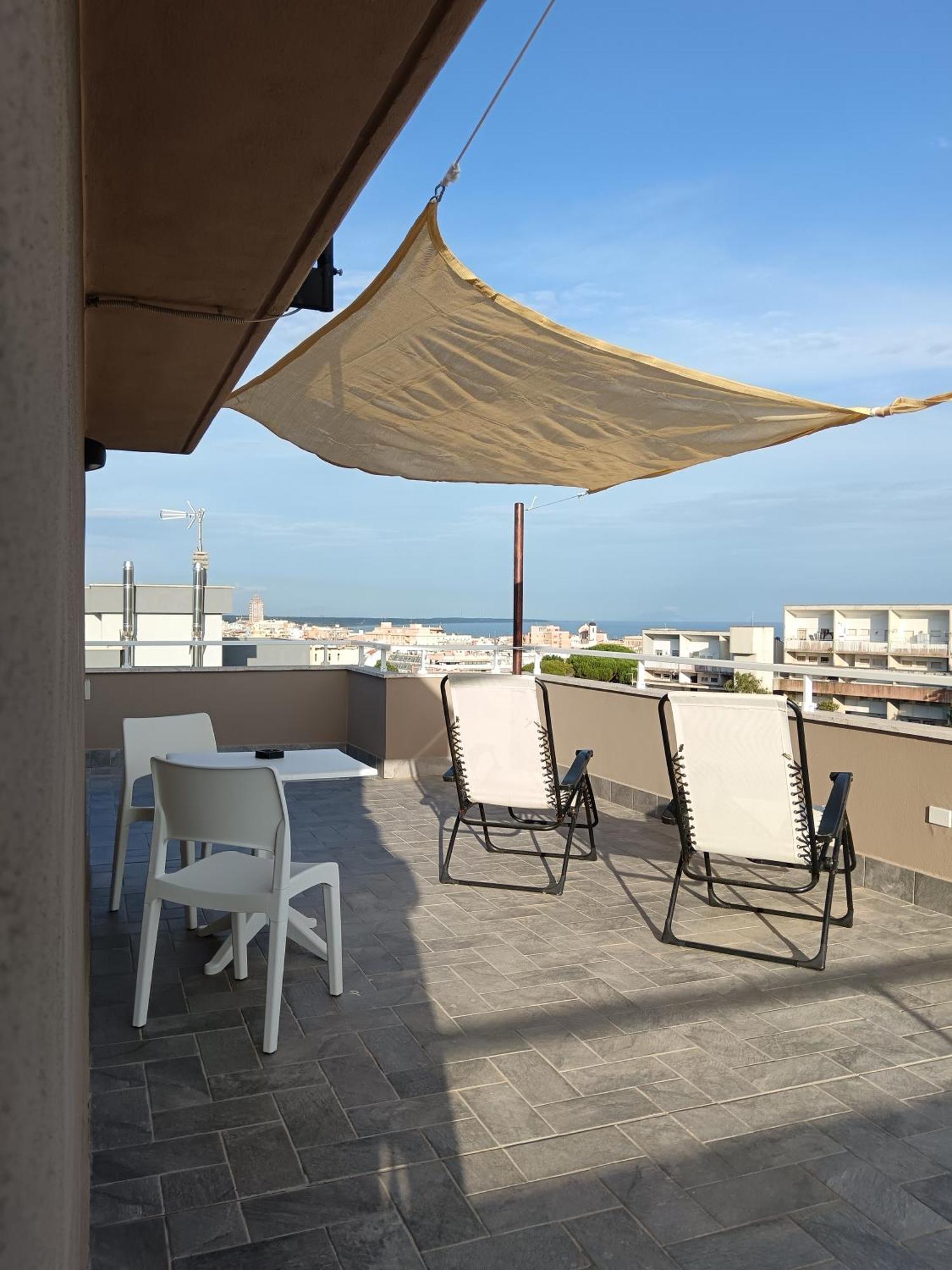شقة Terrazza Delle Rose نيتّونو المظهر الخارجي الصورة